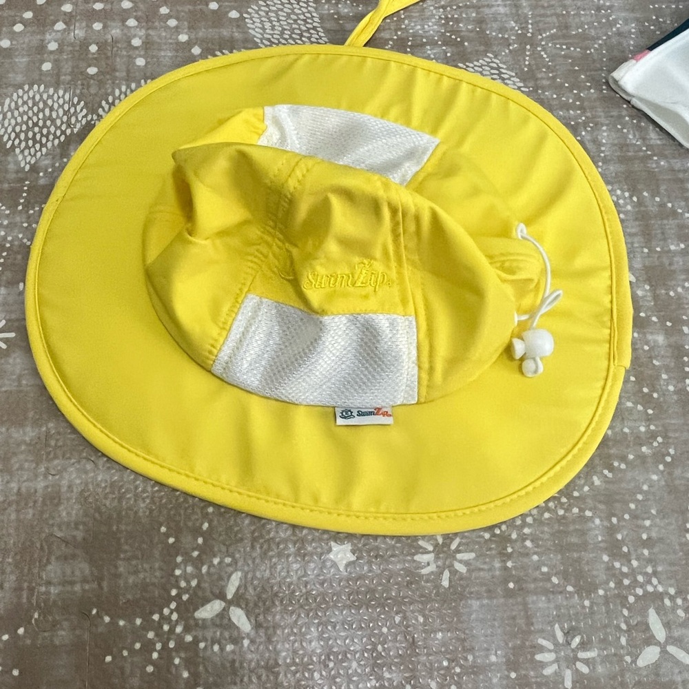 SunZip Baby’s Yellow Sun Hat.
